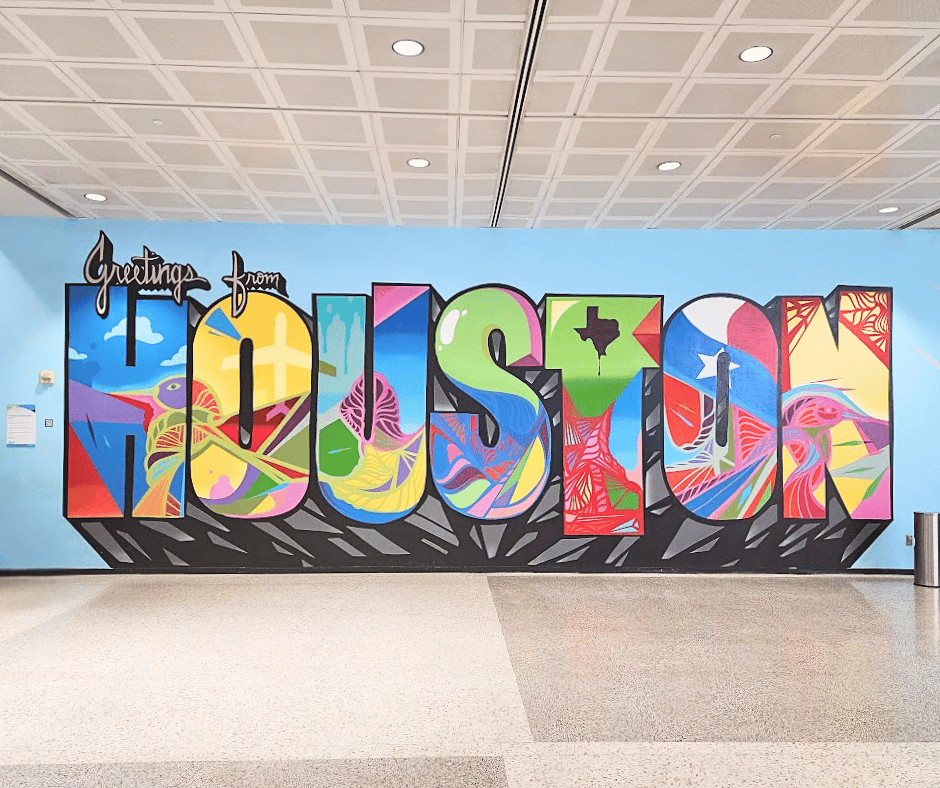 Be welcomed by the Greetings from Houston mural right at the airport