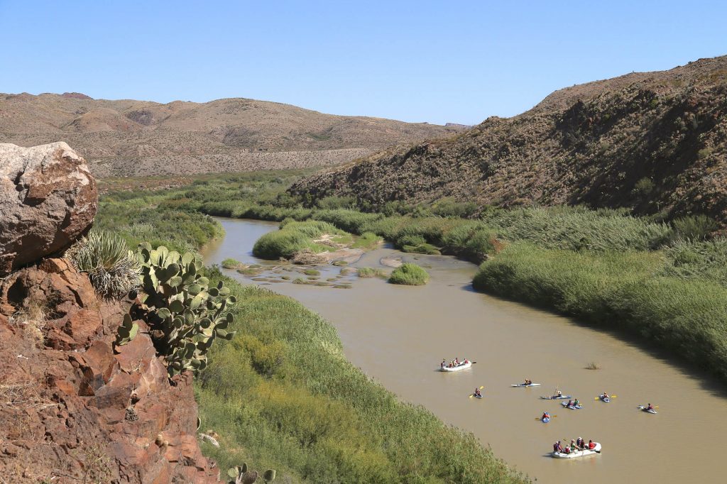 Rafters floating the Rio Grande River as it comes out of Madera Canyon Big Bend Ranch State Park Texas